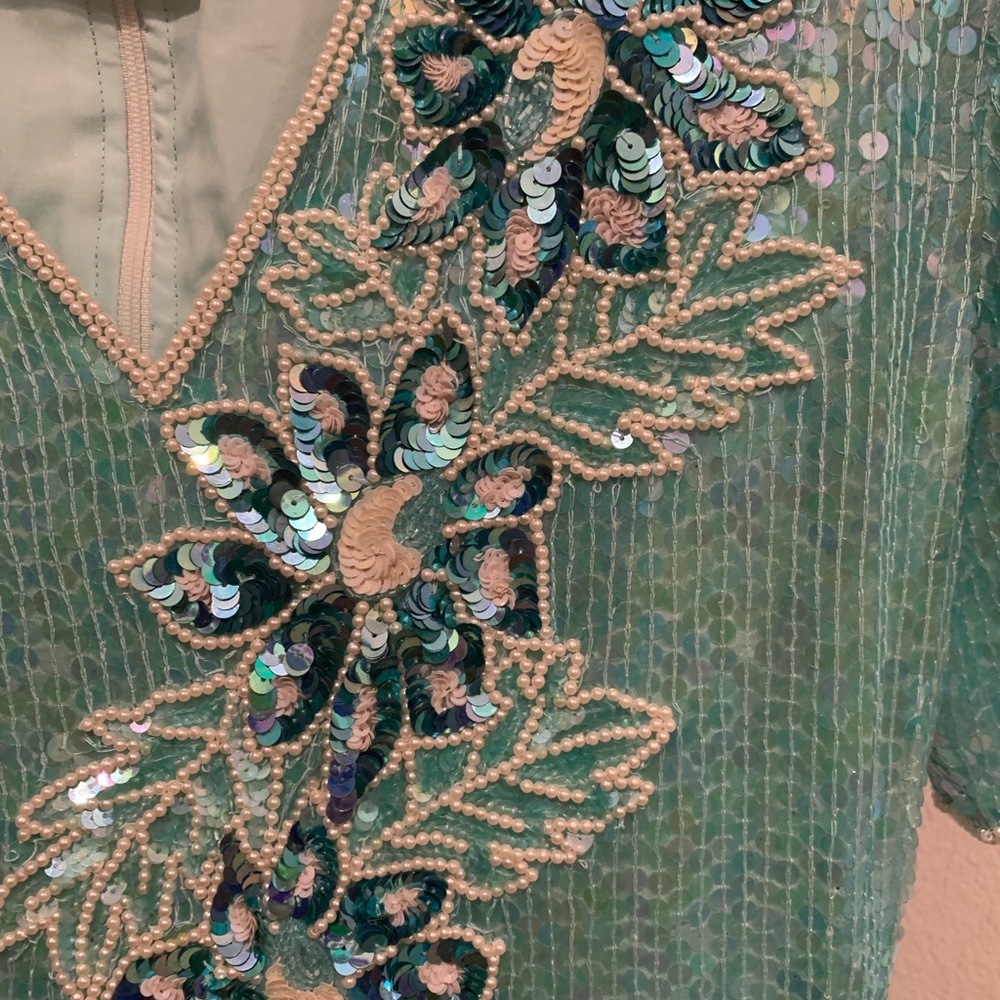 An Elegant Aqua Marine Two-Piece Ensemble.